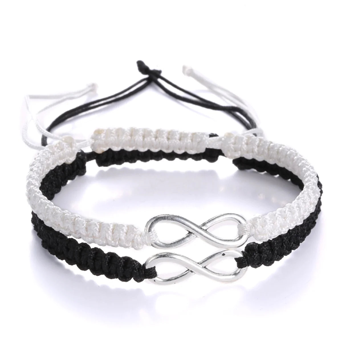 Matching infinity couple bracelets on white background