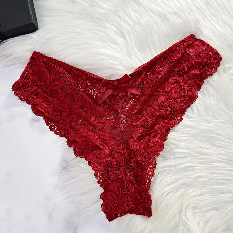 Matching red lace thong with bow detail included in set