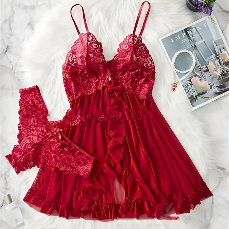 Red lace nightdress and matching thong lingerie set displayed on white fur background, elegant romantic sleepwear for women.